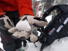 What was Dec 15 near crust facets, now moist from rain. Easily makes a snowball.