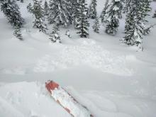 Small wind slab triggered by dropping a cornice onto a N facing test slope.