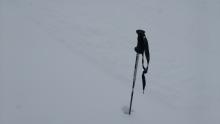 Ski cuts on typically wind loaded test slopes along the summit ridge produced only small loose dry activity. Poor light, difficult to see shallow debris in photo.