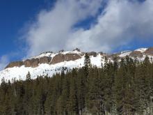 No visible blowing snow along the ridges. 