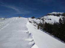 Eroded cornices above SE aspect terrain.