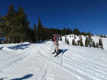 Crack in the snowpack as a cornice pulls away from the ridge.