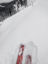 Skier triggered shooting cracks propgated about 20 ft from the front and back of my skis on a wind-loaded test slope.