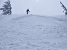 Small wind slab avalanche intentionally triggered on a test slope.  Crown 12-16'' deep.