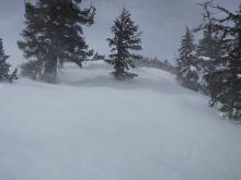 Blowing snow on east ridge, transporting left to right onto N aspect terrain.
