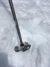 In sunny areas several inches of transitioning wet snow was present by late morning. 