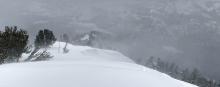Blowing snow along the summit ridge of Powderhouse.