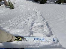 Wet snow surface sluffing, moving in the direction of loose wet instability.