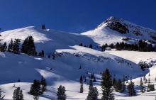 wind effected snow below ridgelines