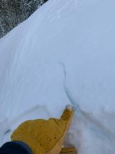 Skier triggered shooting cracks on N facing wind loaded slope.