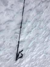 Uneven sun sculpted snow.