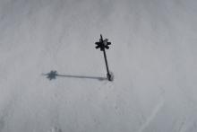 At 8300 feet on an open south facing slope at 900am surface snow was firm, but softer wet snow was present below. 