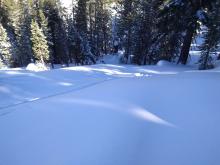 A whumpf with a noticeable vertical drop while ascending this area.