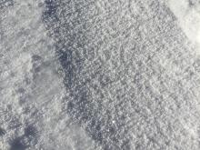 Thin graupel layer on surface. 