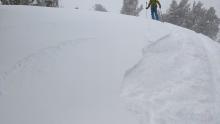 A ski cut triggered some short cracking in the wind blown snow on this SW facing test slope, but the wind slab was so soft that it immediately fell apart.