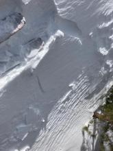 Small wind slab in NW aspect near treeline terrain at about 7,900'.