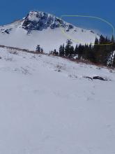 Moderate amounts of blowing snow visible on above treeline peaks in the area.