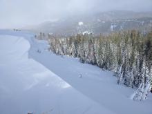 Natural wind slab avalanche from earlier this morning. Blocky hard slab debris not very visible in this photo. Cornice hazard kept us from getting a better look at this avalanche.
