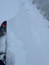 The wind features on low angle terrain near the summit were touchy and failed around two feet deep.