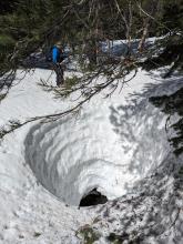 Deep holes that go down to flowing creeks are starting to form in the Castle Peak Meadows.